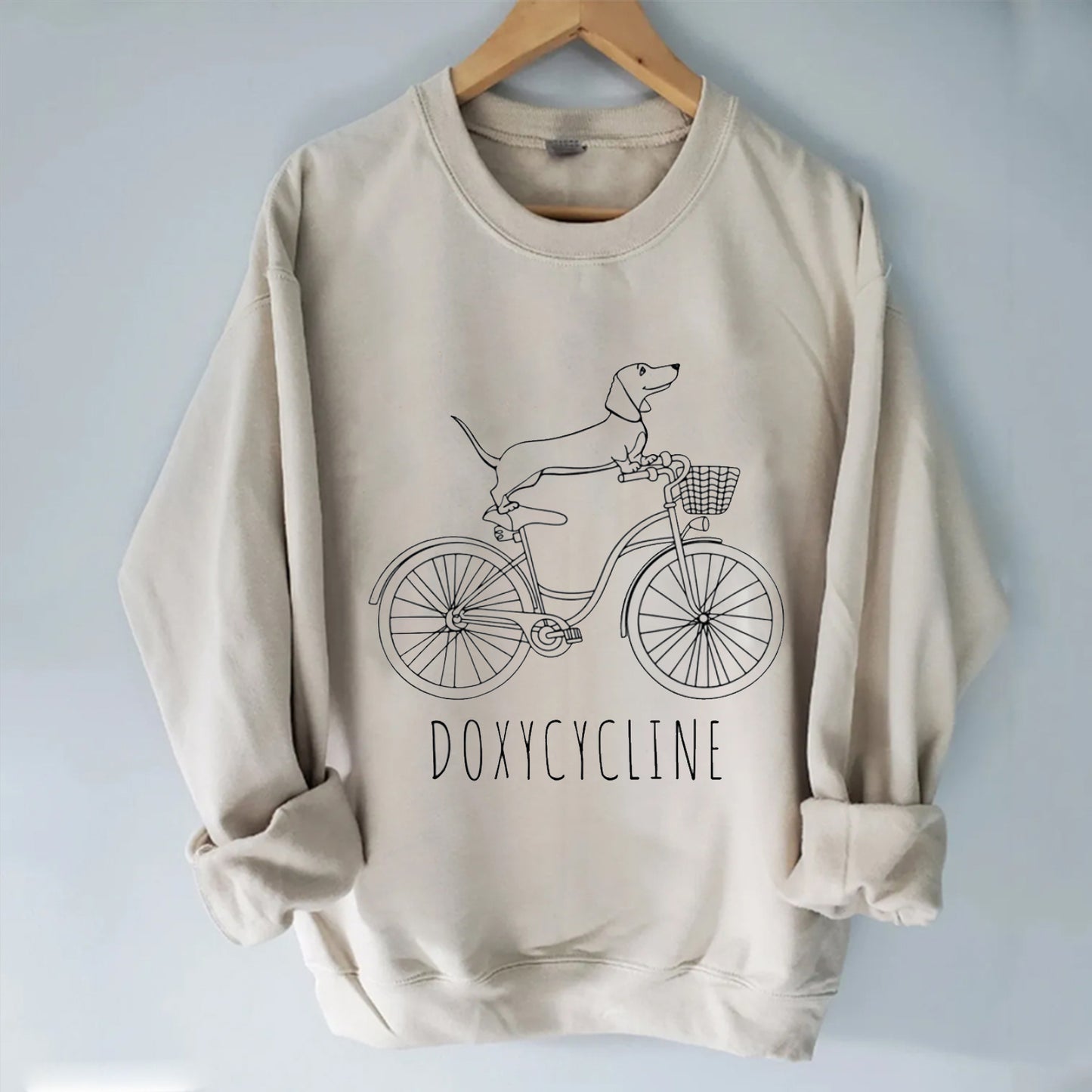 Dachshund on Bicycle Sweatshirt