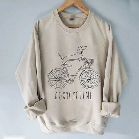 Dachshund on Bicycle Sweatshirt