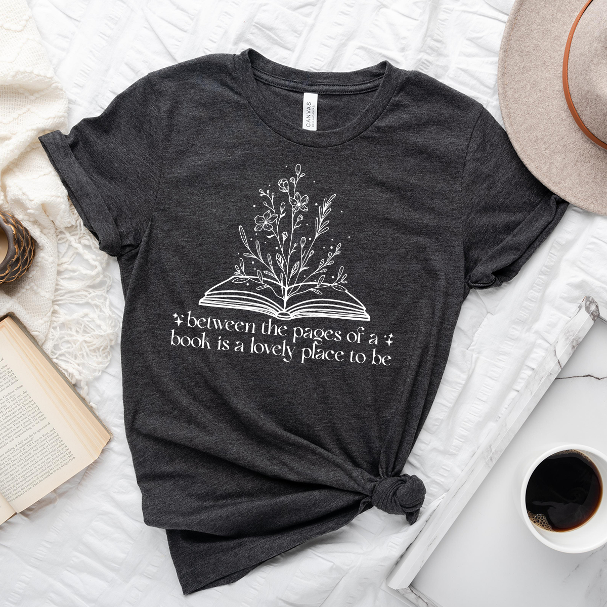 between the pages unisex tee