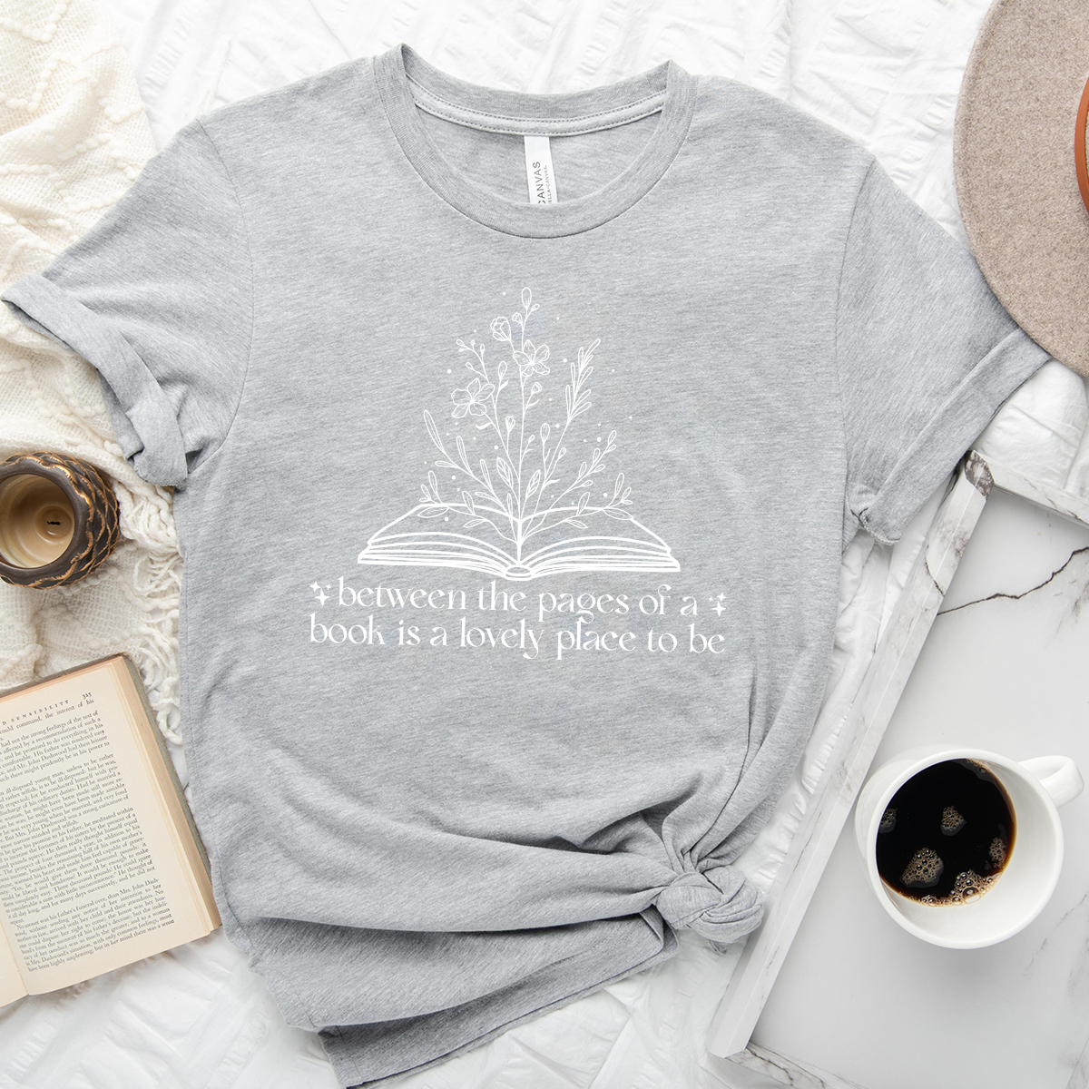 between the pages unisex tee